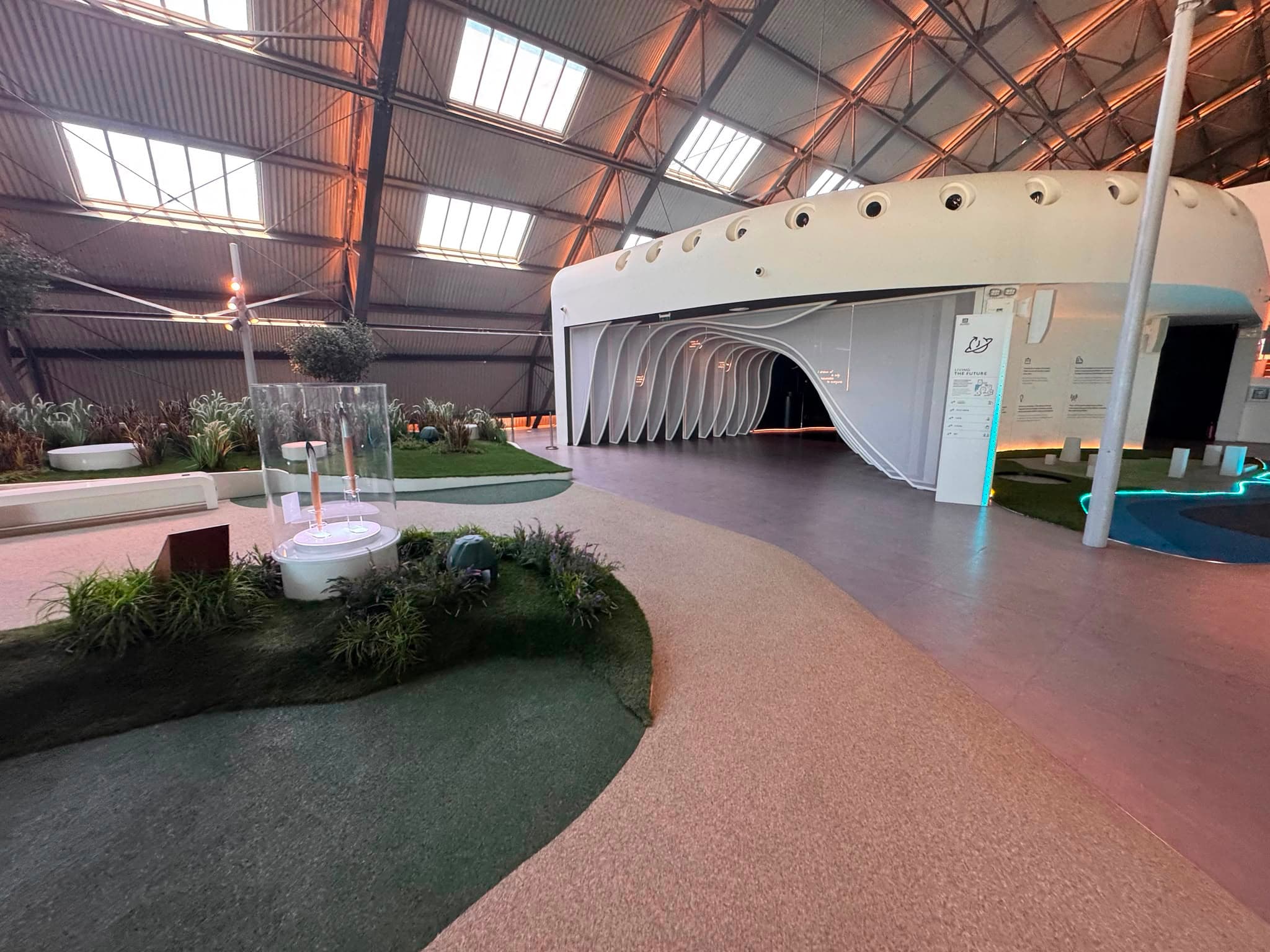 Landscaped exhibition hall with skylights