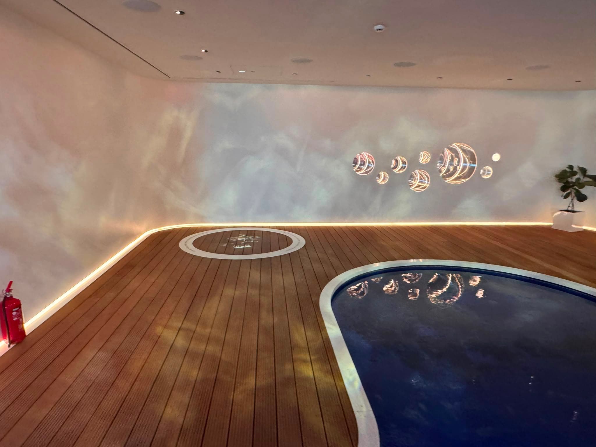 Room with pool and light installations